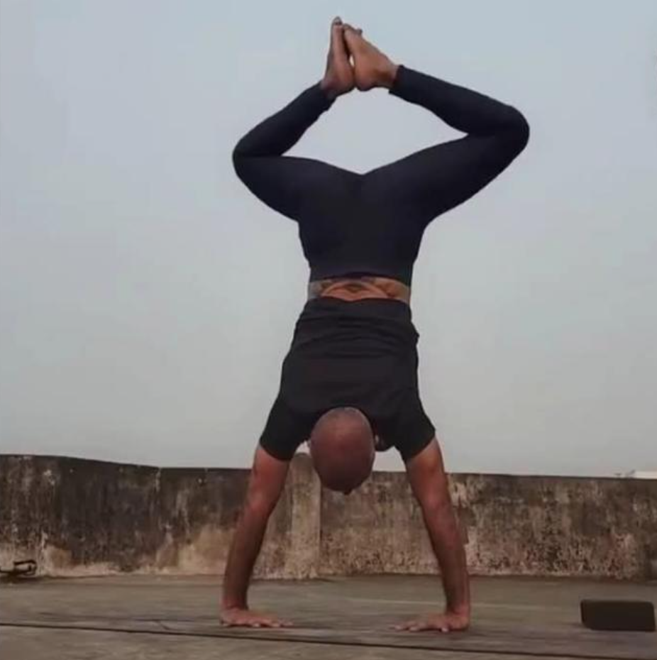 Pawan making handstand